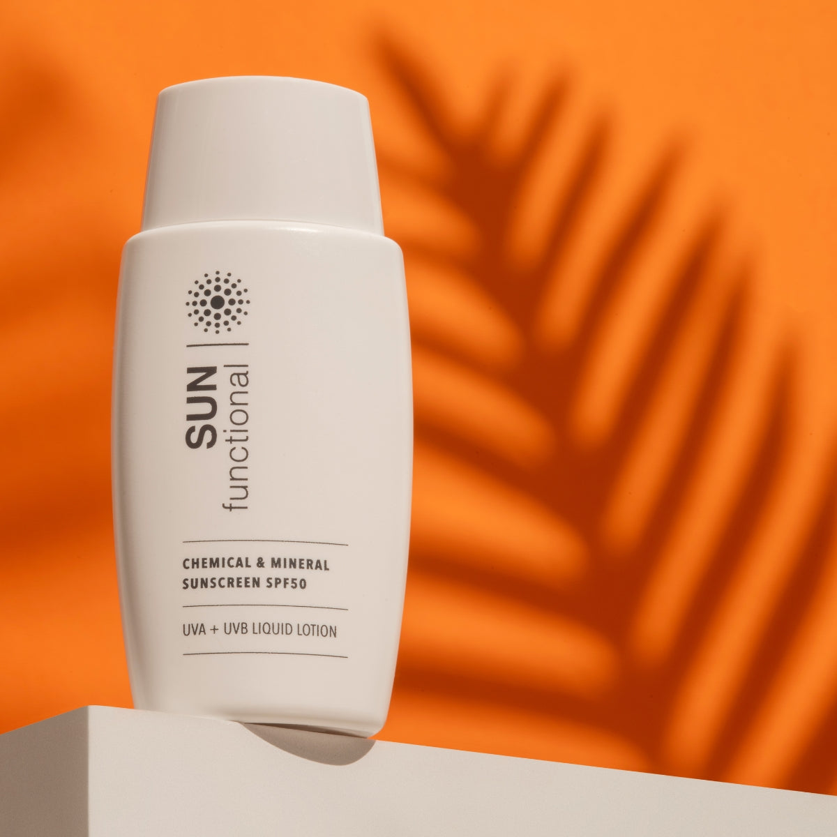 Sun Rays Additive Sunscreen bottle labeled 'SUN functional' on an orange background with ...