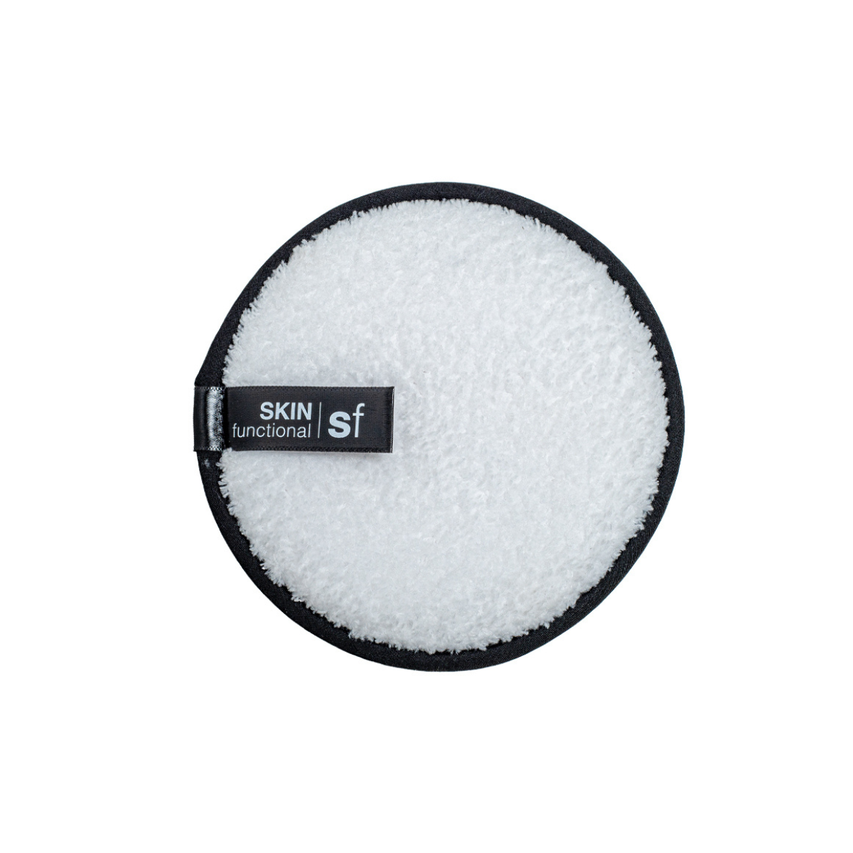 Round white cleaning pad with 'Skin Functional' label on a white background